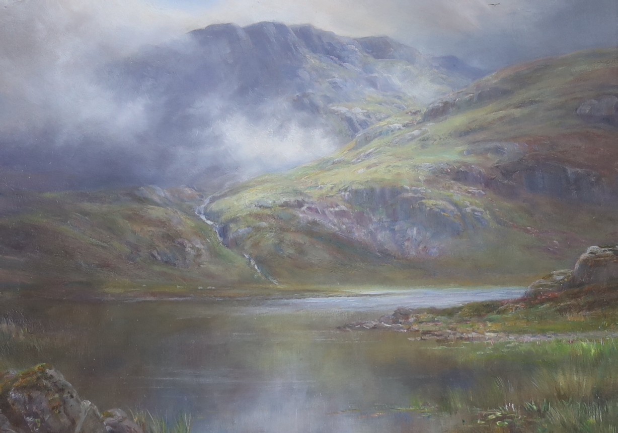 William Lakin Turner (1867-1936), oil on board, 'Sparkling Tarn, Cumberland', signed and dated 1928, 25 x 35cm.